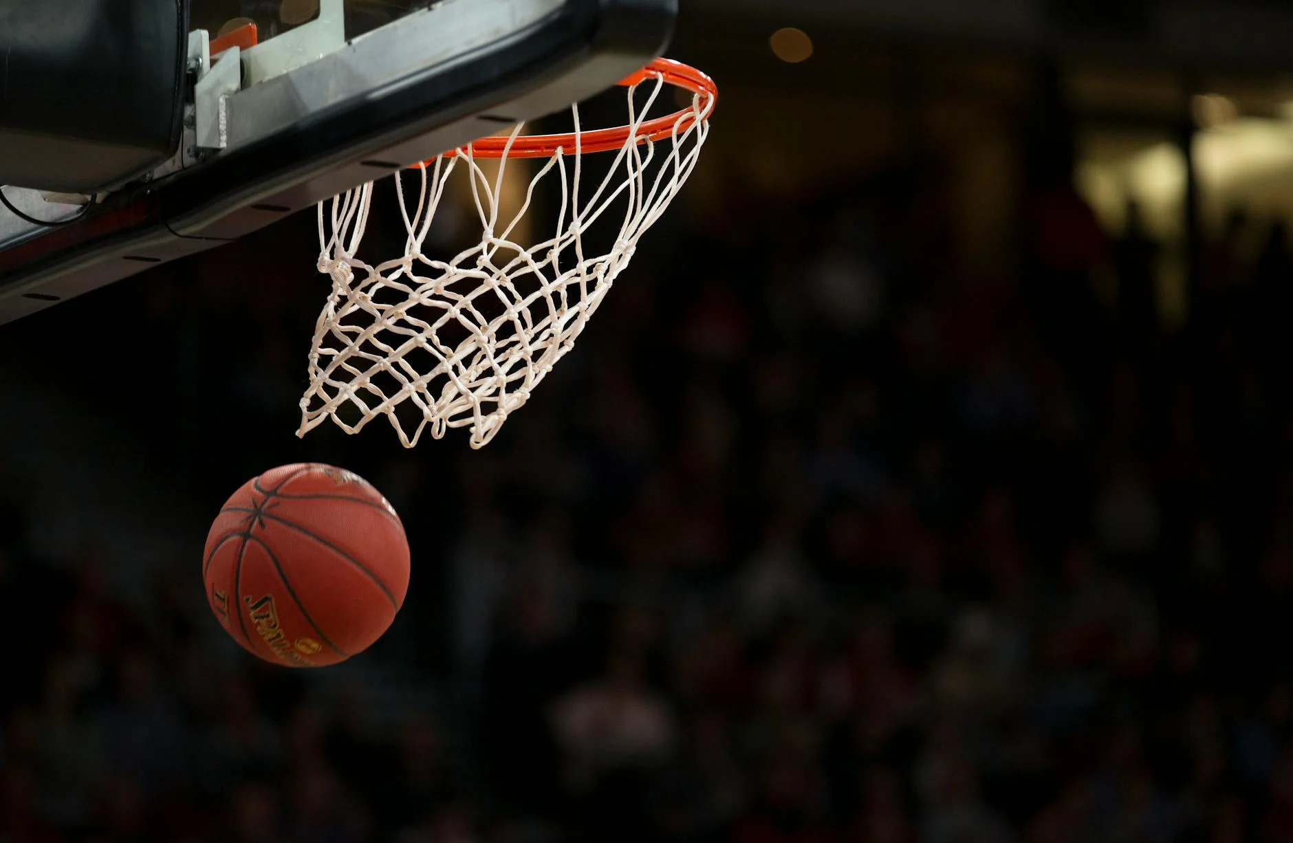 Basketball court with ball on hardwood floor
